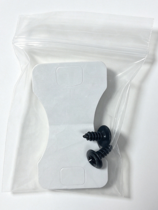 Adhesive mount and fixing screws